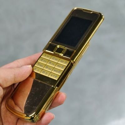 Harga yang bagus 2G GSM Dual SIM Bluetooth Baru Klasik 8800 Slider Ponsel 2.4 inci Layar on line